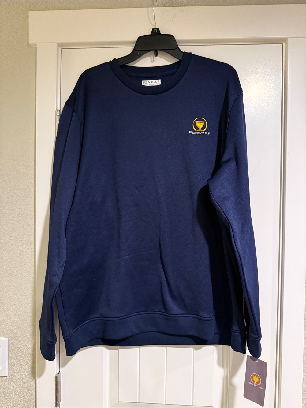 PGA Tour Navy Crewneck Sweatshirt with Yellow Presidents Cup Logo